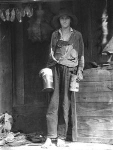 Miss Elsie Stewart, tomboy on cabin porch