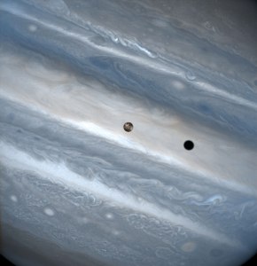 Io, one of Jupiter's moons, in transit around the giant planet. Io travels quickly, completing an orbit of Jupiter every 1.8 days. Credit: J. Spencer (Lowell Observatory) and NASA/ESA
